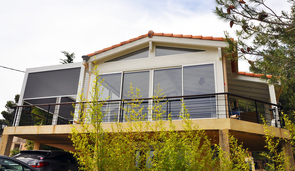une veranda extension bois sur pilotis